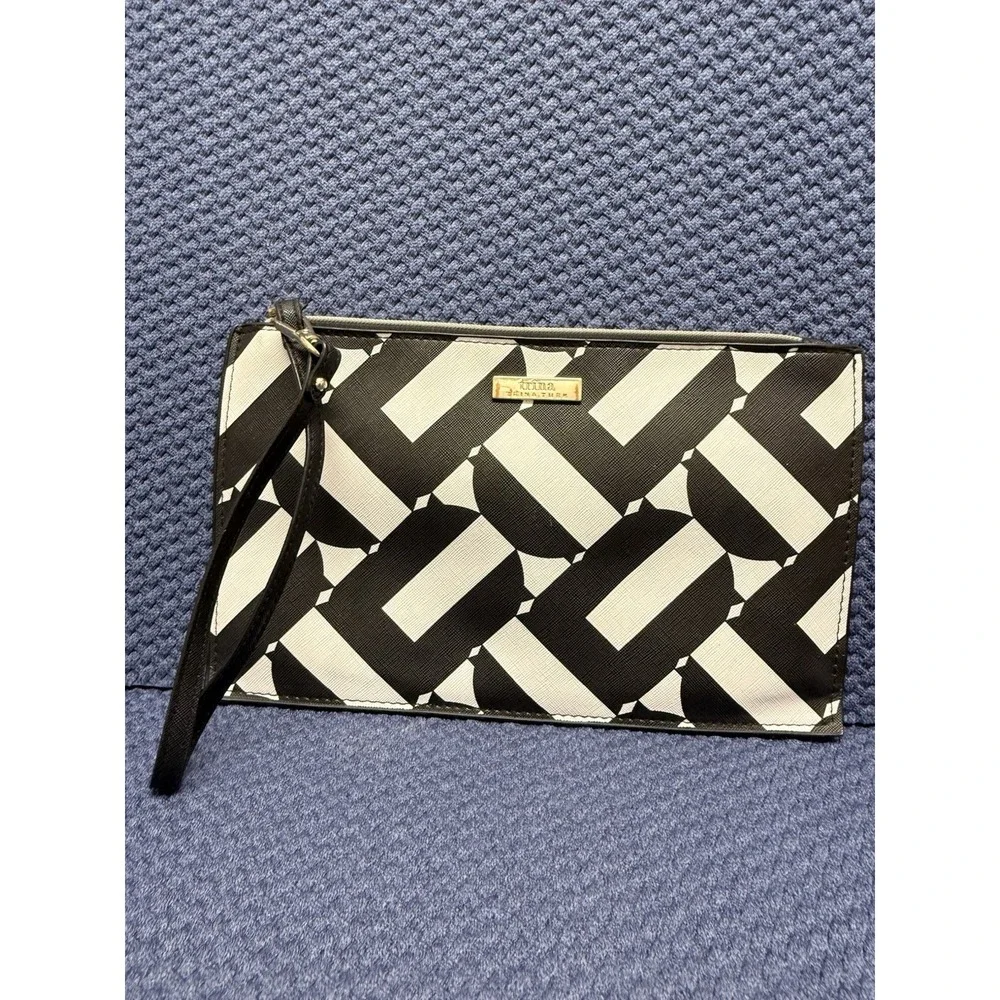 Trina by Trina Turk black and white‎ cosmetic bag with geometric pattern
